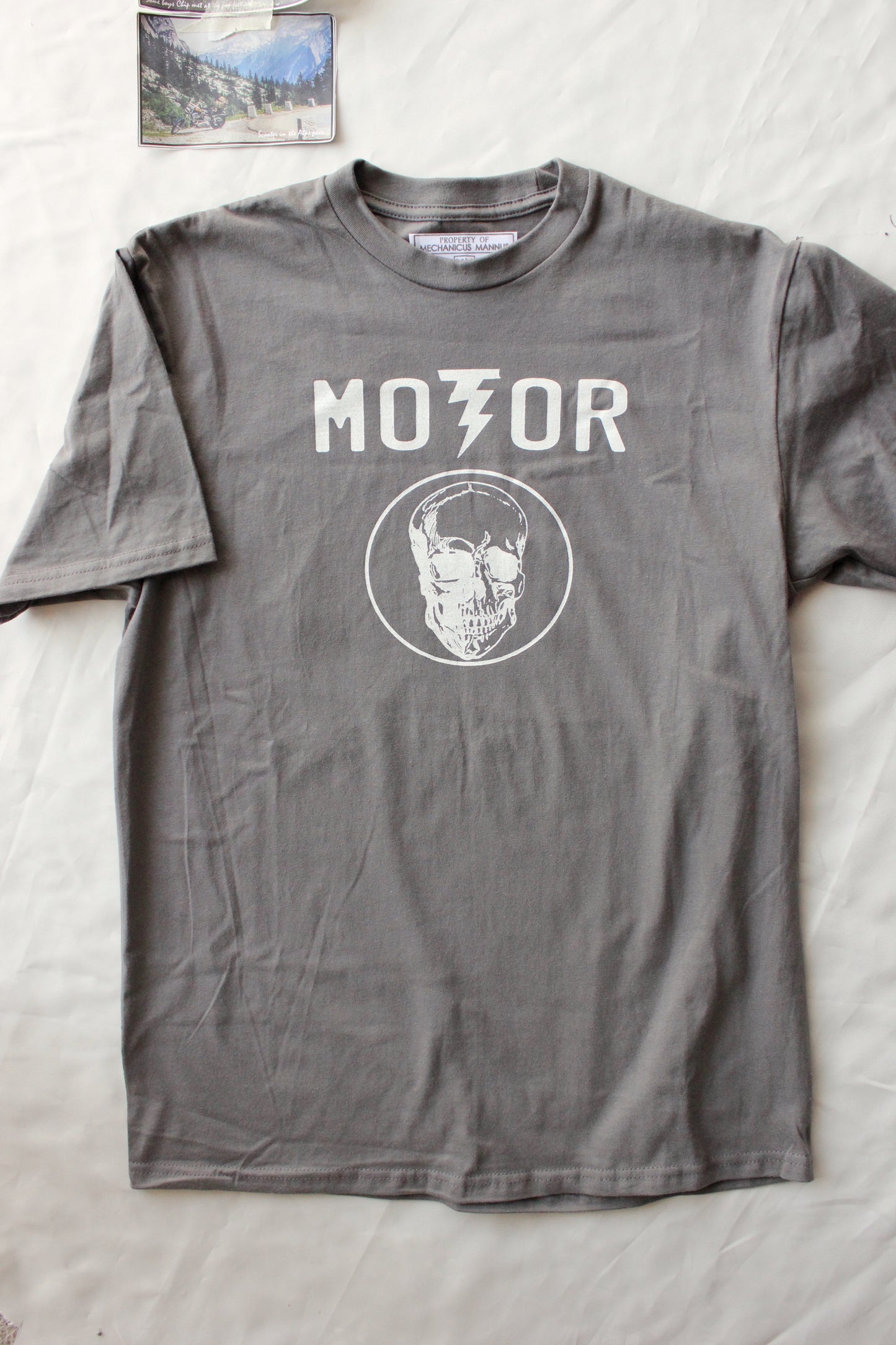 The “ faded motor tee”
