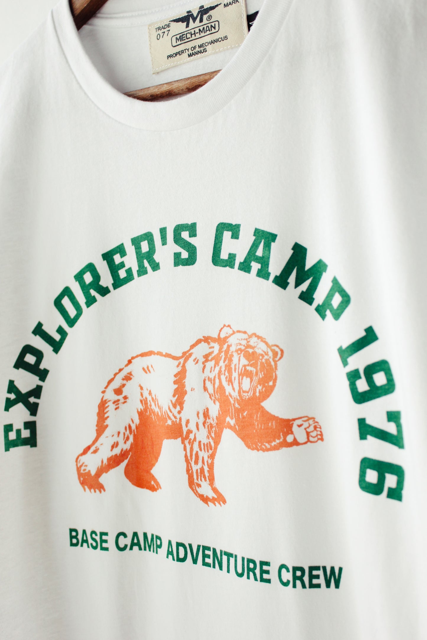 The “explorer’s camp 76” tee
