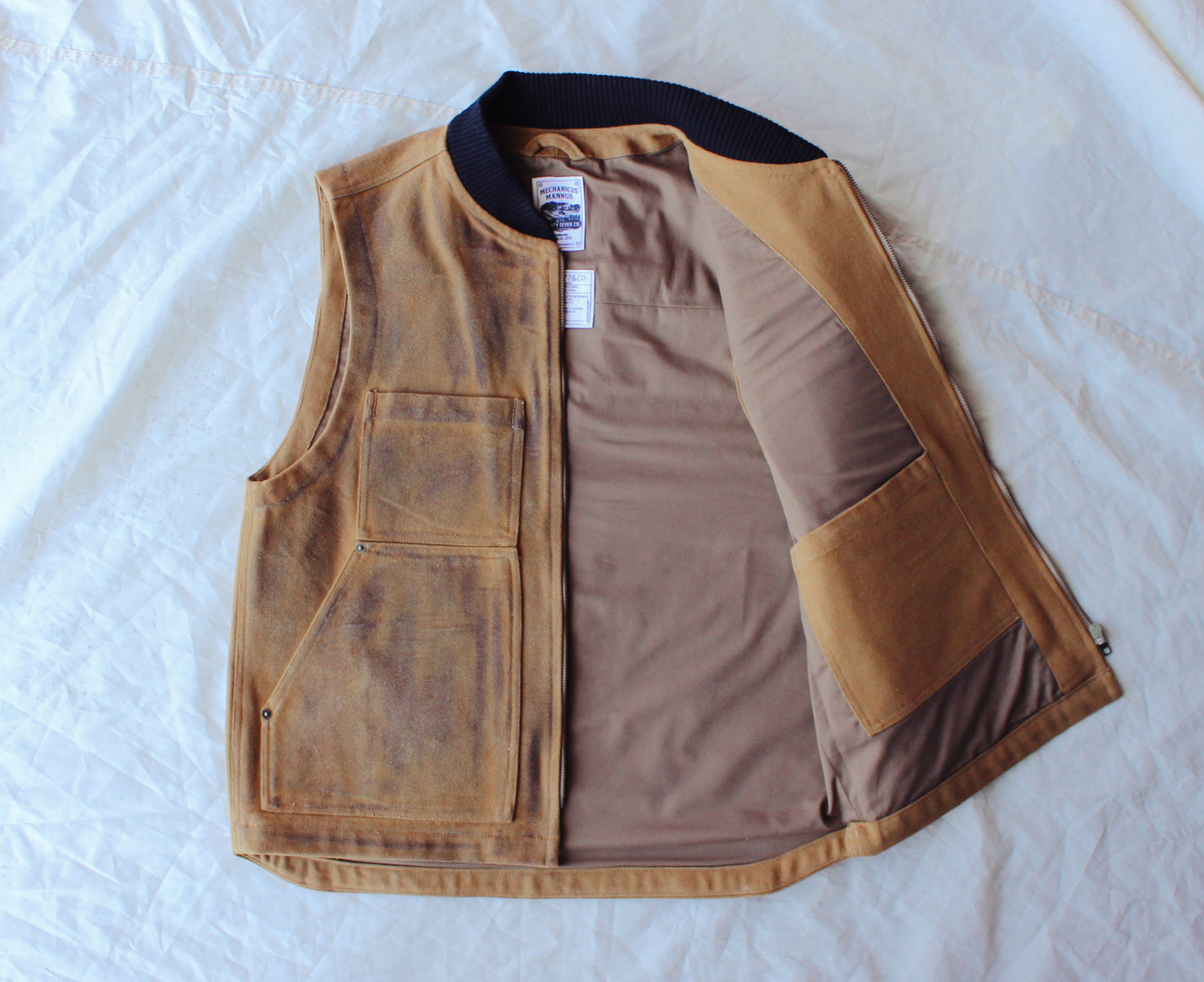 The “ 077 Rusty Logger vest “ waxed canvas