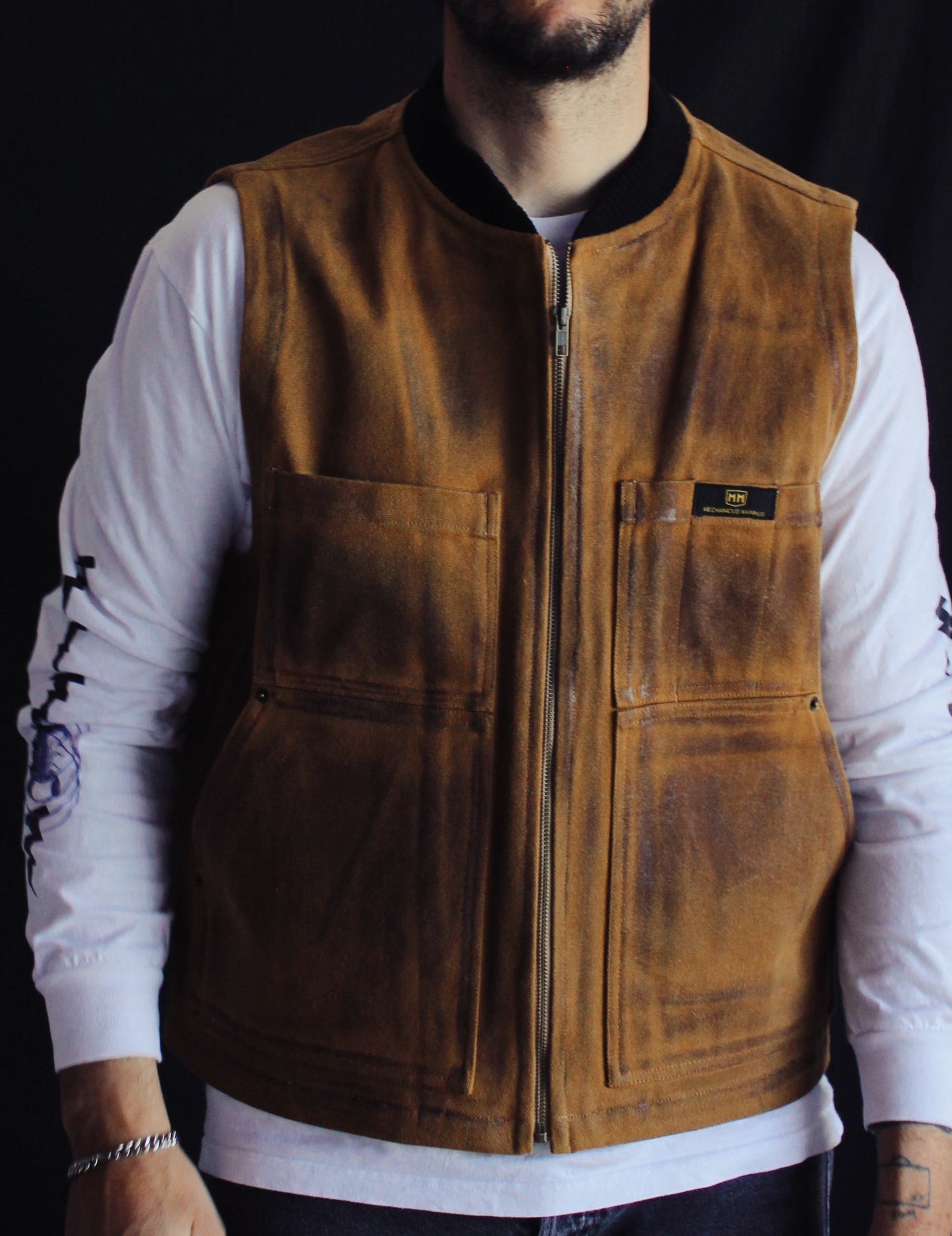 The “ 077 Rusty Logger vest “ waxed canvas