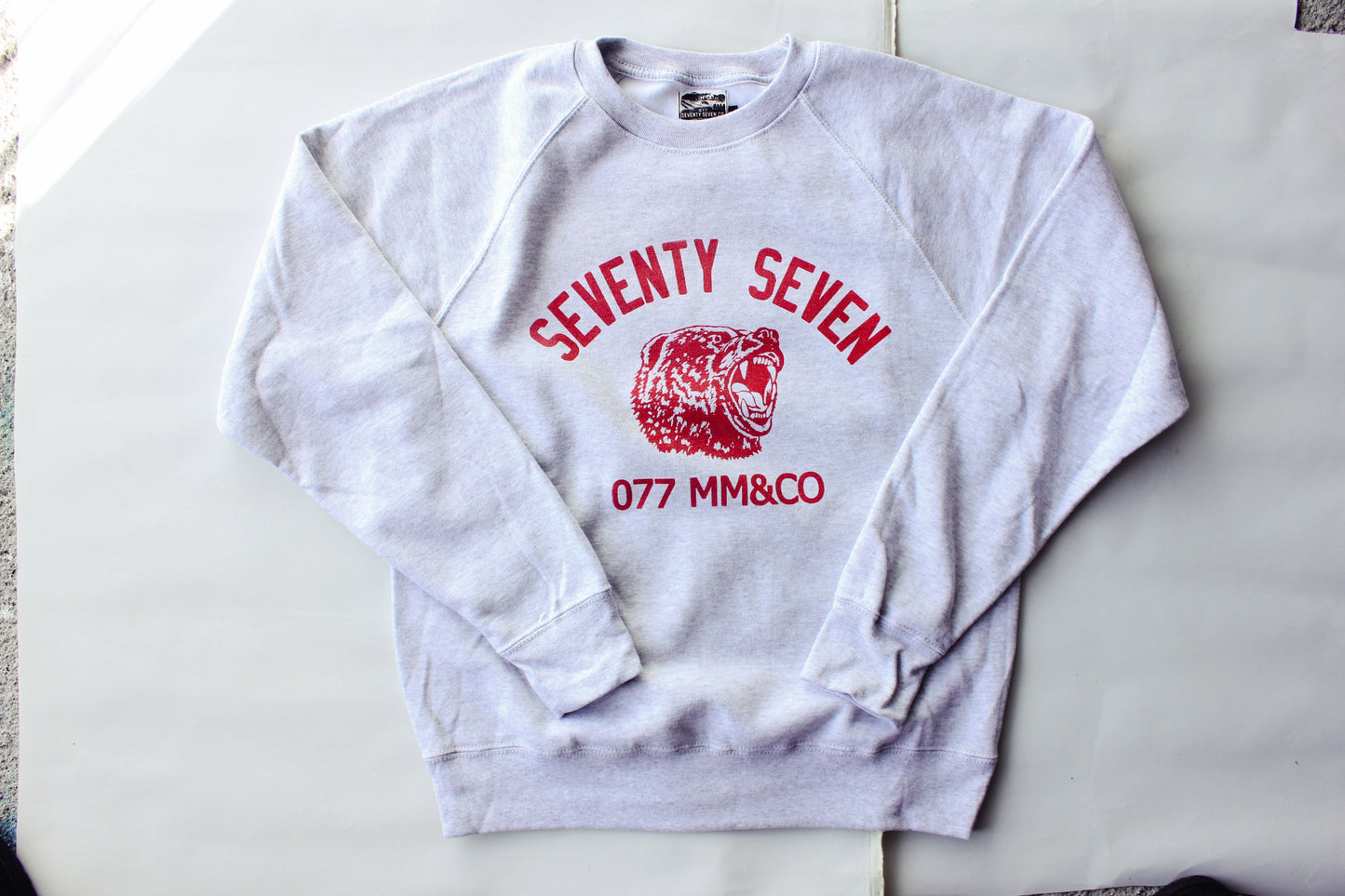The “ 077 sweatshirt “