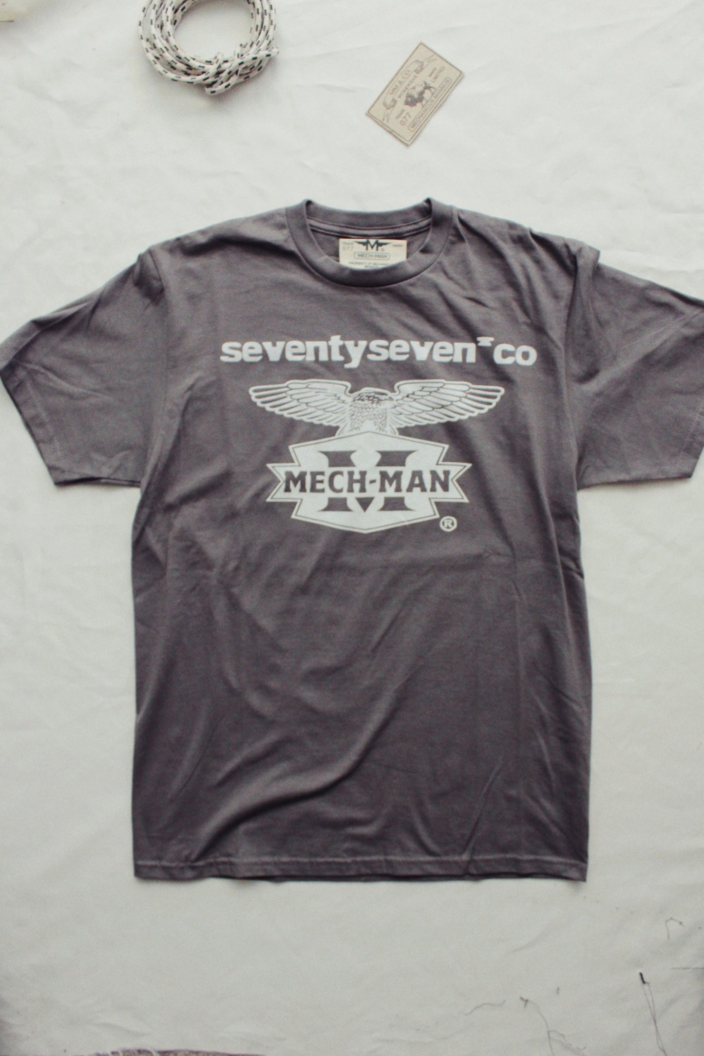 The “seventy seven faded black” tee